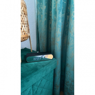 Logo trade reklaamtoote pilt: Äratuskell ja juhtmevaba laadija ADELAIDE