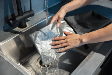 Logotrade profilreklam bild: Snackstrap AWARE™ RPET vikbar lunchväska 30x20CM